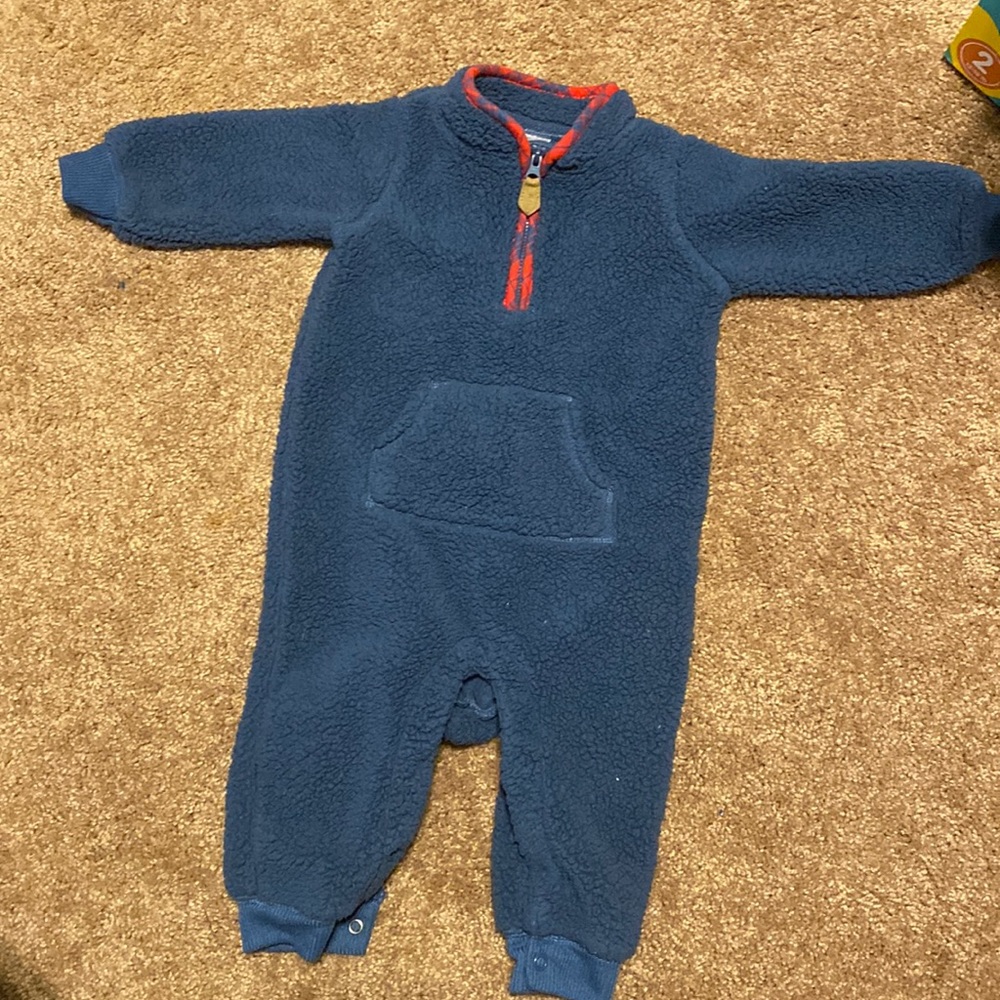 Carter’s blue snuggly body suit size 9 months